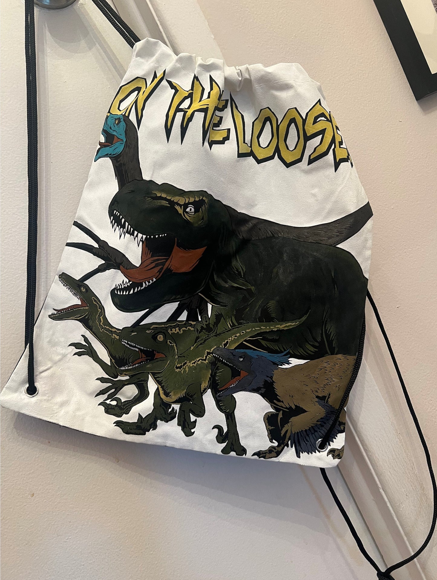 13 x 15 Hand Painted "On the Loose" Dinosaur Boys Kid's Drawstring Backpack